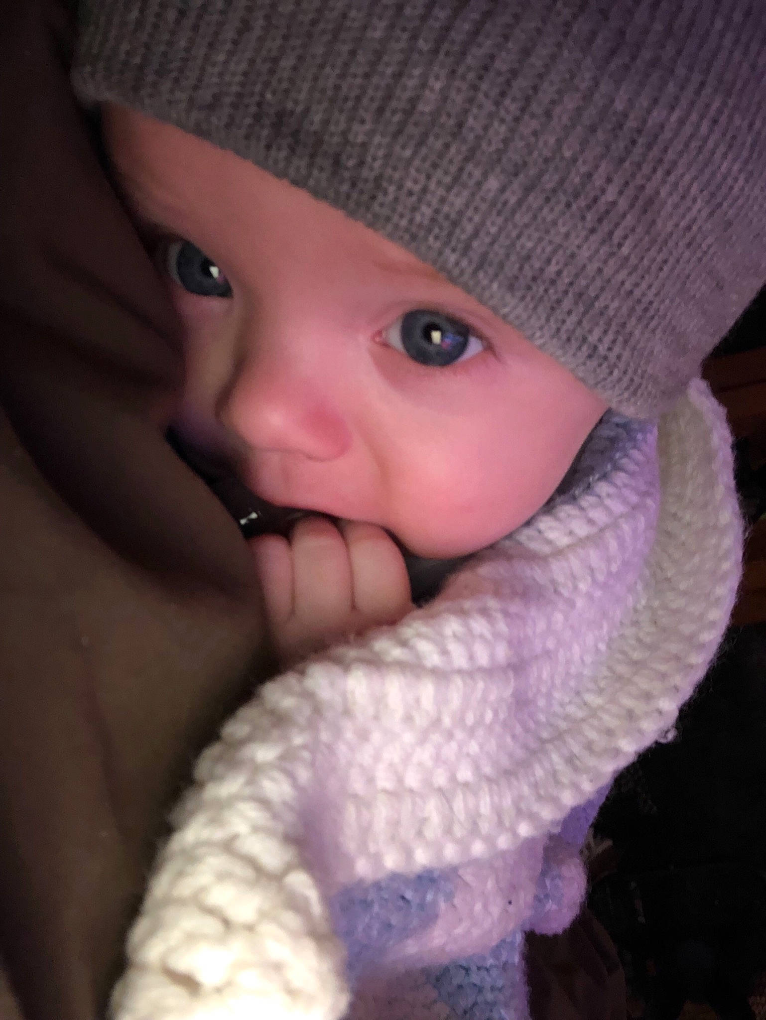 Gunnar is registered to the contest to win money with this photo: baby, cheek, child, eye, eyelash, face, finger, hand, headgear, knit_cap, knitting, lip, mouth, nose, person, pink, purple, skin, toddler, wool