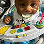 baby, bib, blanket, blue_pajamas, child, close_up, colorful_toy, cute, face, hand, happy, indoor, infant, pacifier, person, playing, seat, soft, toy_piano, young_child