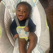 Amaree joined the competition — help win amazing prizes! baby, baby_seat, child, clothing, comfort, cute, fabric, face, hands, happy, indoors, infant, pattern, person, rocker, seat, seatbelt, skin, small, smiling