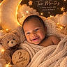 Jj is registered to the contest to win money with this photo: baby, infant, smiling, portrait, two_months, blanket, knitted_blanket, teddy_bear, milestone, wooden_plaque, crescent_moon, stars, fairy_lights, clouds, cozy, sleeping_setup, nursery, warm_lighting, photography, celebration