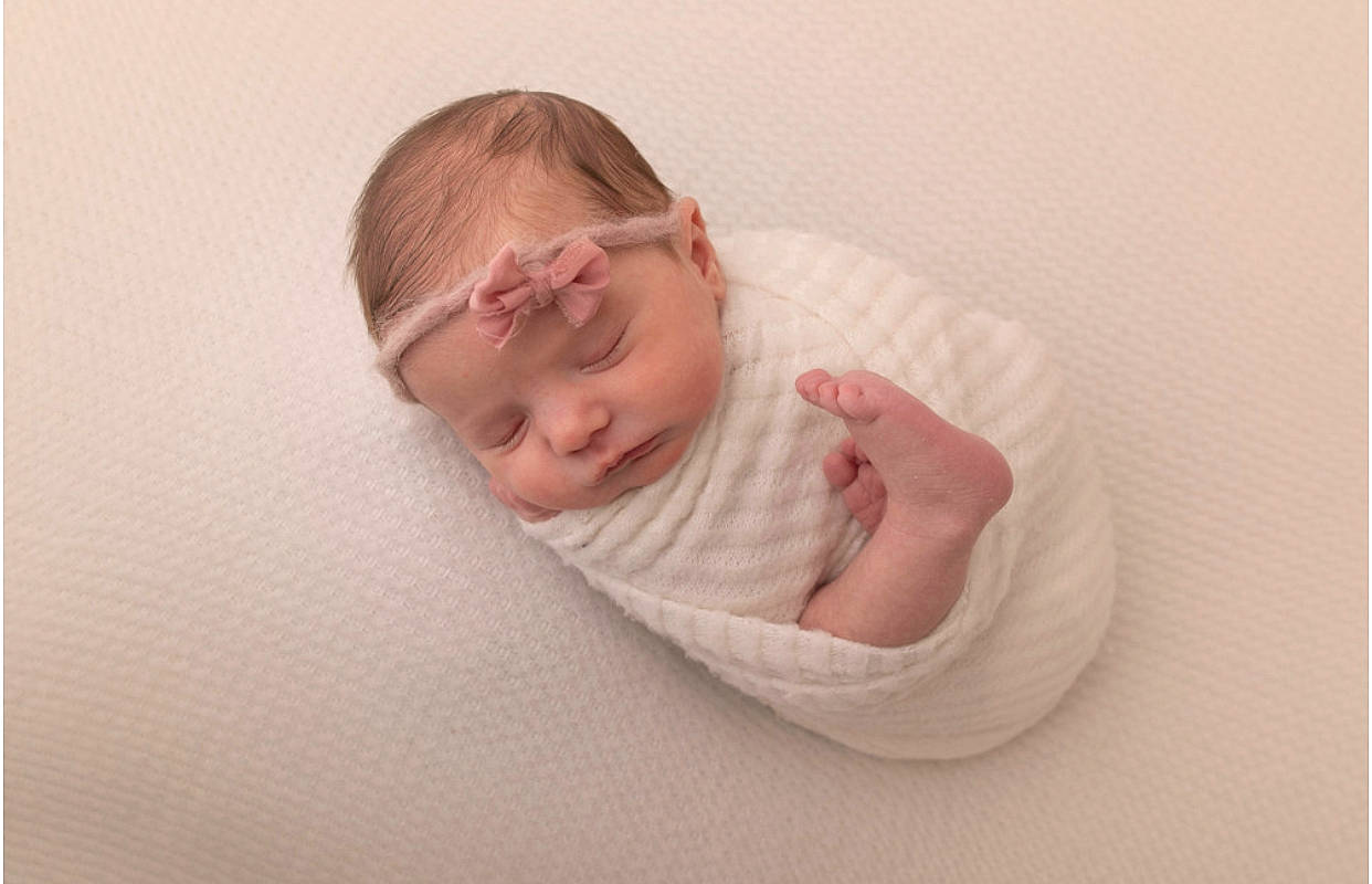Jemma is registered to the contest to win money with this photo: baby, baby_sleeping, baby_toddler_clothing, bedding, bedtime, cheek, comfort, elbow, flooring, gesture, glasses, happy, human_body, linens, nap, person, room, sitting, sleeve, smile