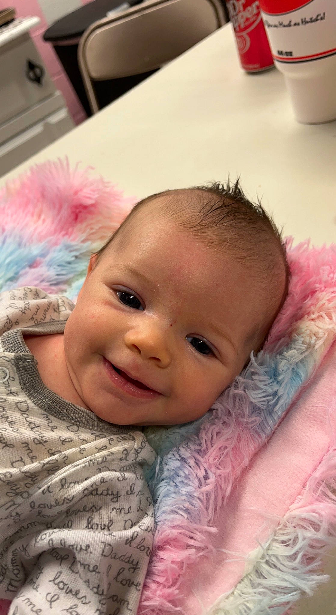 Bexley is registered to the contest to win money with this photo: baby, baby_toddler_clothing, cheek, chin, ear, eye, eyebrow, eyelash, face, facial_expression, happy, head, iris, joy, lip, mouth, nose, person, pink, skin