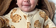 Eloise joined the competition — help win amazing prizes! baby, child, infant, smiling, face, blue_eyes, hooded_blanket, bear_ears, cozy, onesie, cookie_pattern, cute, portrait, soft_texture, indoor, closeup, sleepwear, happy, person, toddler