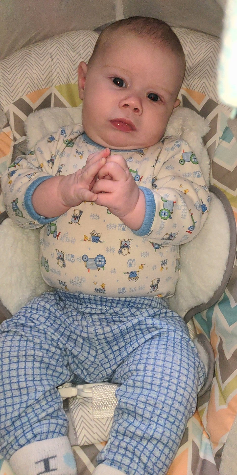 Danny is registered to the contest to win money with this photo: abdomen, baby, baby_toddler_clothing, blue, cheek, child, comfort, happy, lap, linens, lip, neck, pattern, person, sitting, skin, sleeve, smile, thigh, toddler