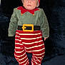 Ethan a rejoint le concours — aidez-le/la à gagner de superbes lots ! baby, sleeping, infant, costume, elf, holiday, red, green, striped, footed_pajamas, hat, belt, soft, blanket, child, cute, closed_eyes, indoors, portrait, festive