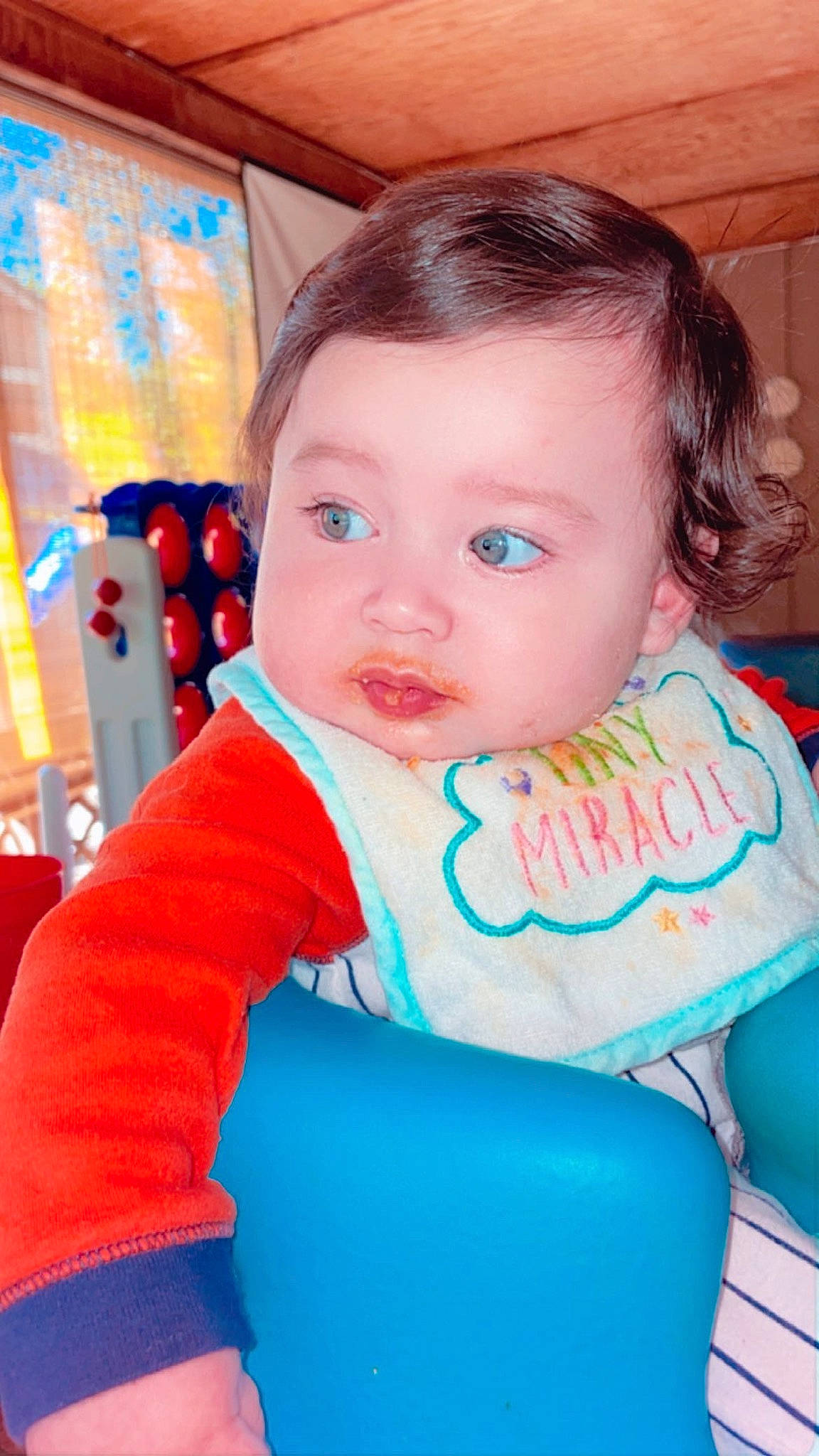 Joseph is registered to the contest to win money with this photo: azure, baby, baby_products, baby_toddler_clothing, blue, chair, cheek, child, comfort, electric_blue, facial_expression, fun, hairstyle, happy, iris, leisure, person, sitting, skin, sleeve