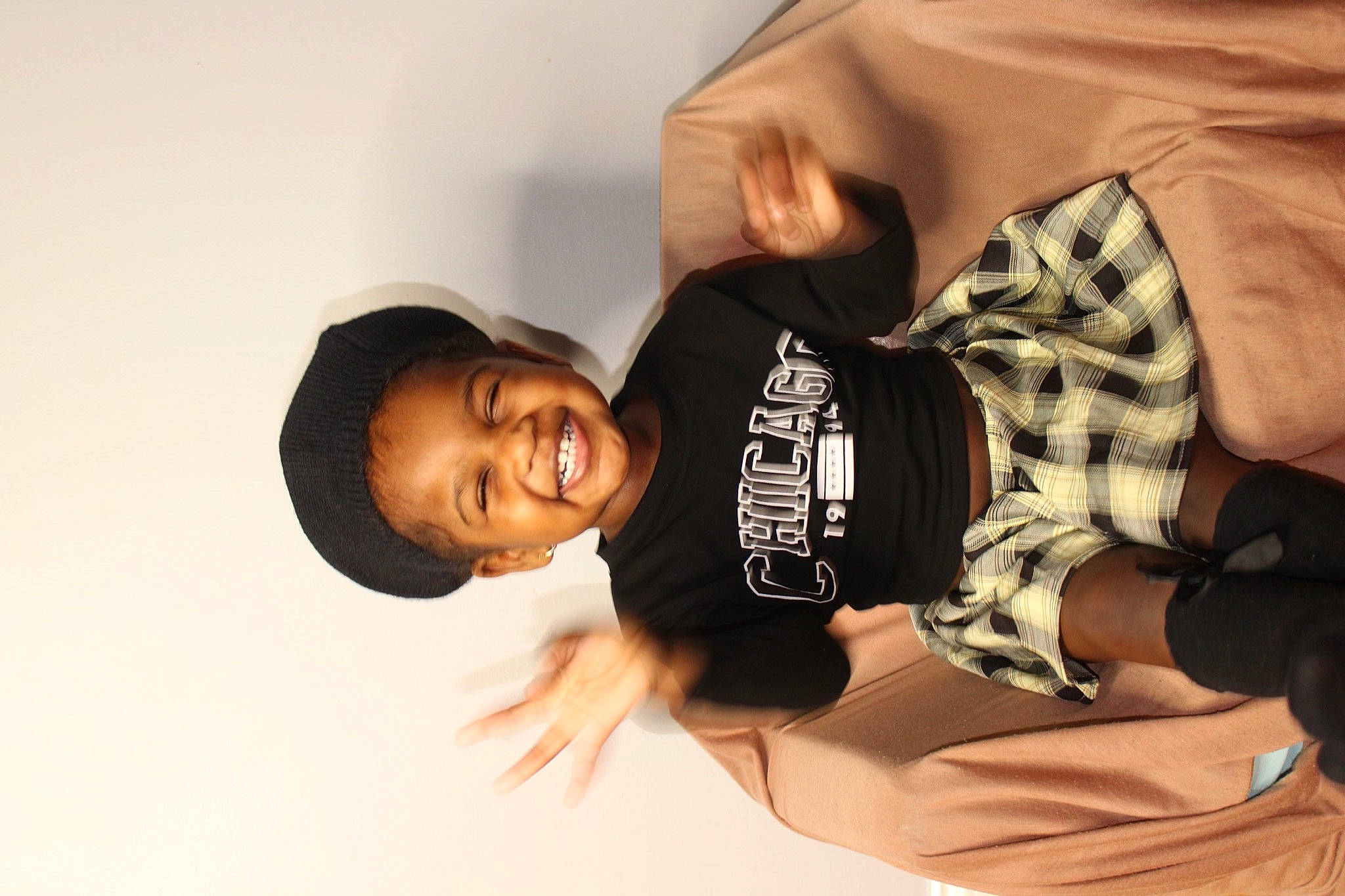 Leilani joined the competition — help win amazing prizes! arm, black_hair, child, comfort, elbow, finger, flash_photography, gesture, happy, human_body, joint, joy, neck, person, shoulder, sitting, sleeve, smile, t_shirt, thumb