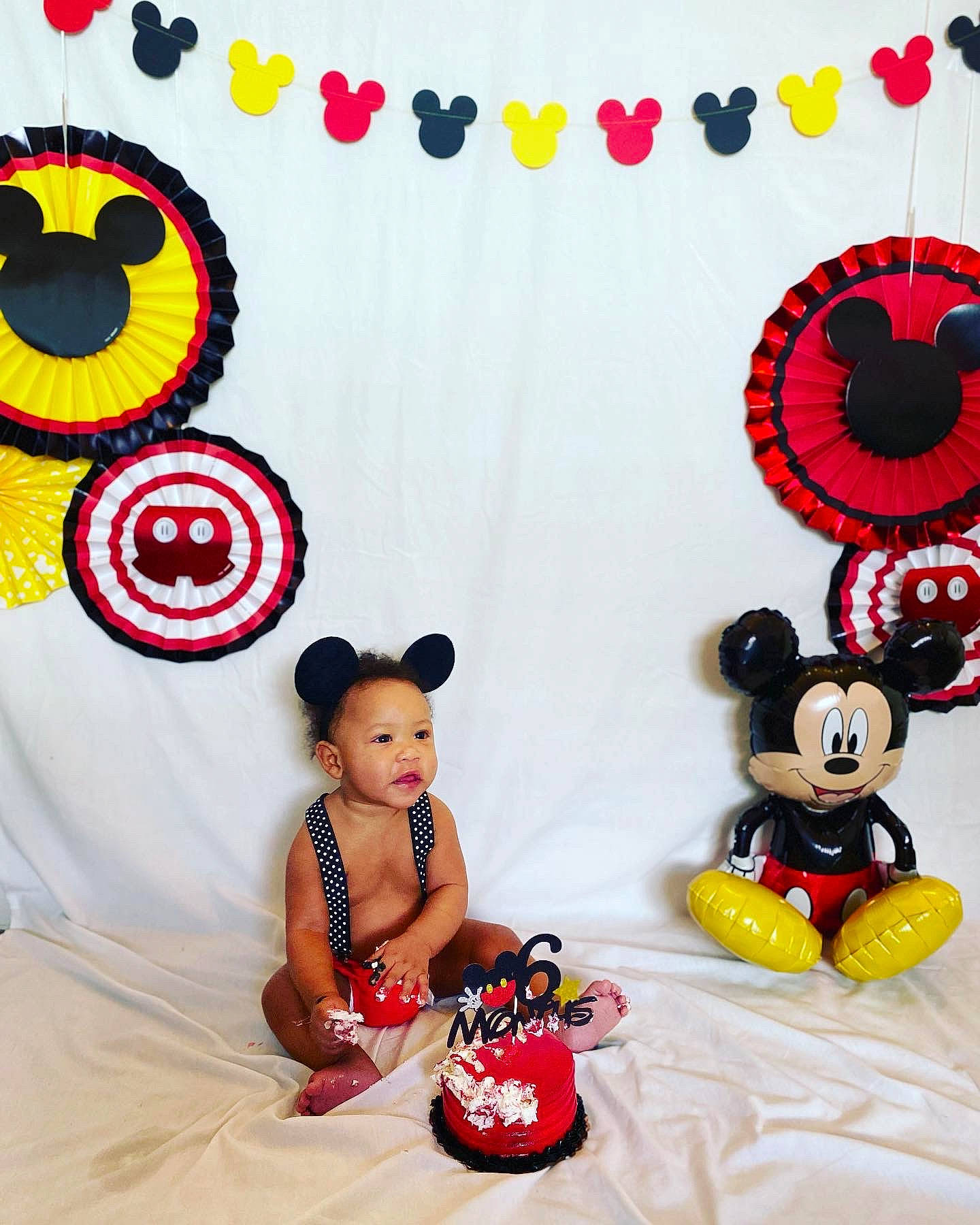 Cairo is registered to the contest to win money with this photo: art, baby, baby_toddler_clothing, circle, costume_hat, facial_expression, fashion_accessory, font, fun, happy, hat, magenta, pattern, person, product, rectangle, sun_hat, t_shirt, textile, toddler