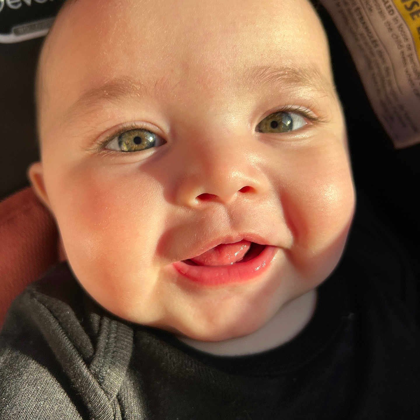 Ava joined the competition — help win amazing prizes! baby, babylaughing, blonde, bodypart, clothing, coat, face, happy, head, jacket, laughing, mouth, newborn, person, photography, portrait, selfie, smile, teeth, tongue