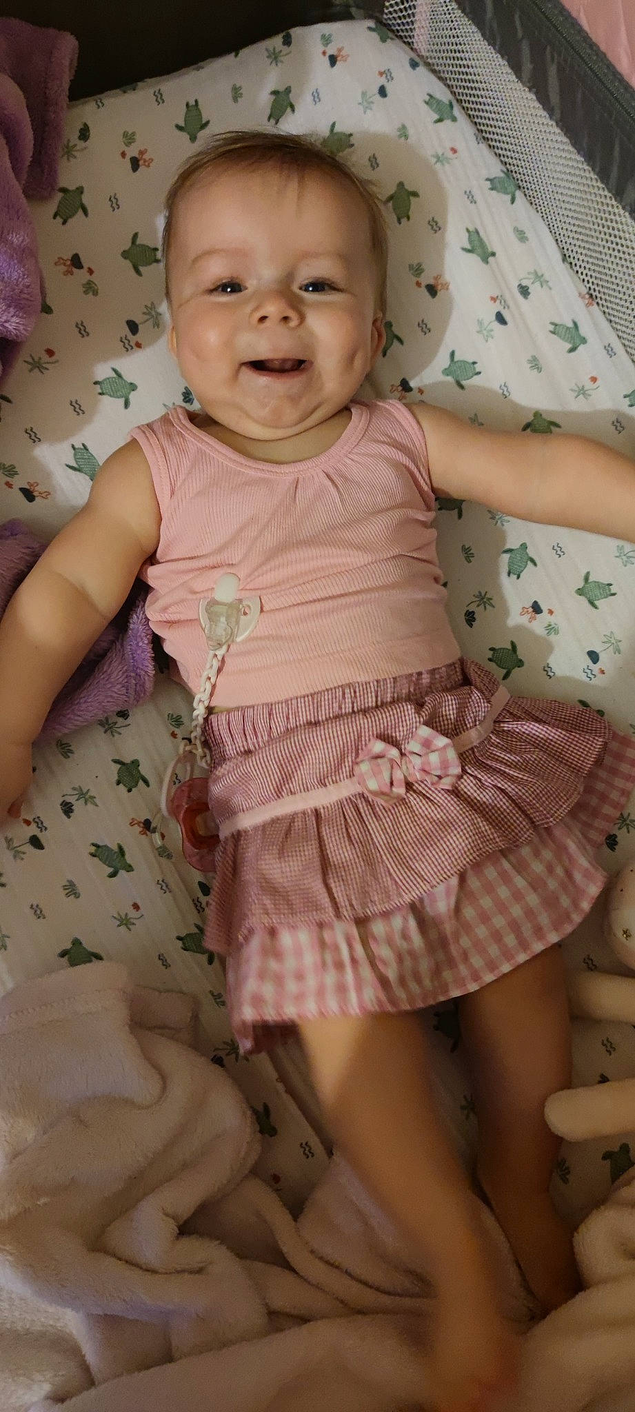 Lindsay a rejoint le concours — aidez-le/la à gagner de superbes lots ! arm, baby, baby_toddler_clothing, dress, face, finger, green, hairstyle, hand, happy, human_body, iris, leg, person, pink, product, skin, sleeve, smile, textile