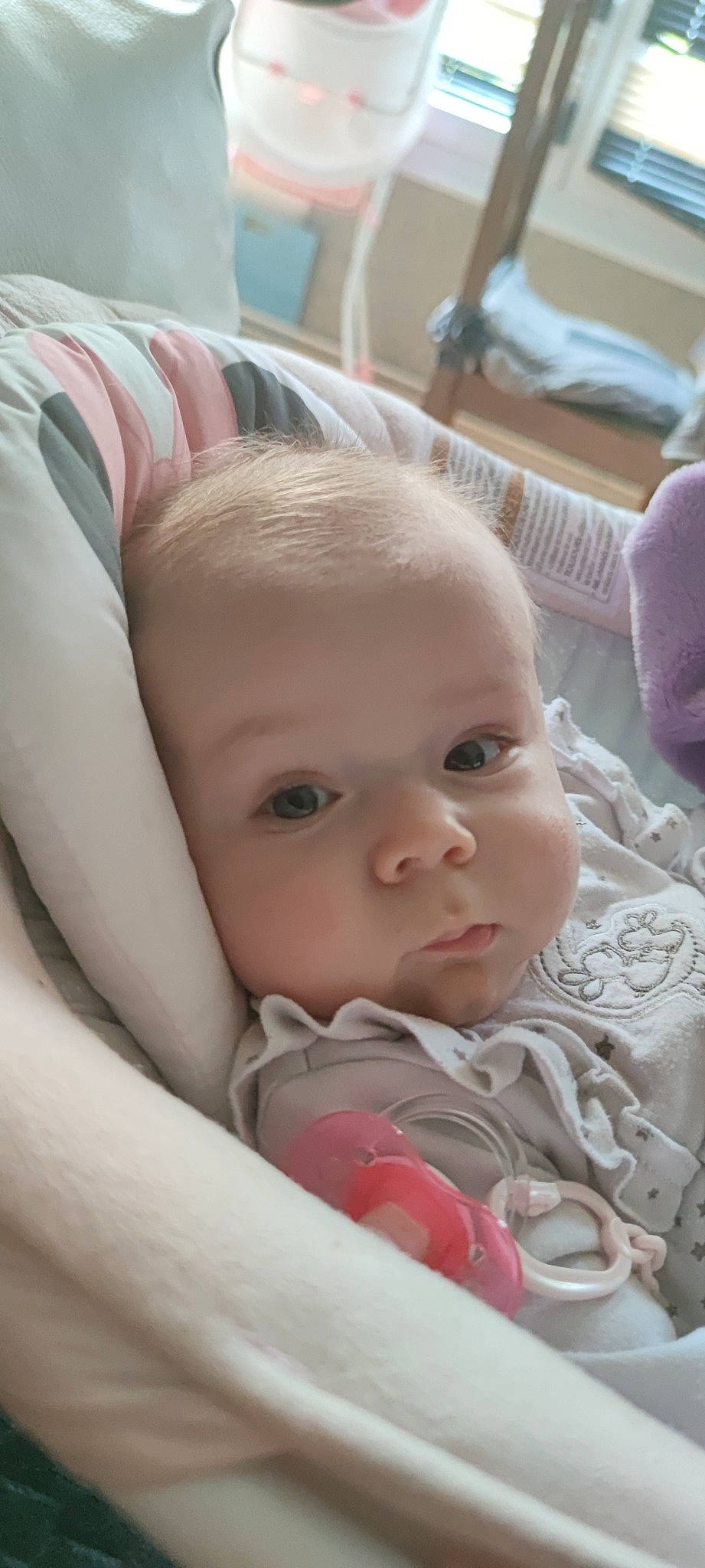 Lindsay participe au concours pour gagner de l'argent avec cette photo : baby, baby_toddler_clothing, cheek, child, close_up, comfort, eye, eyebrow, eyelash, face, head, iris, linens, lip, mouth, nose, person, sitting, skin, smile