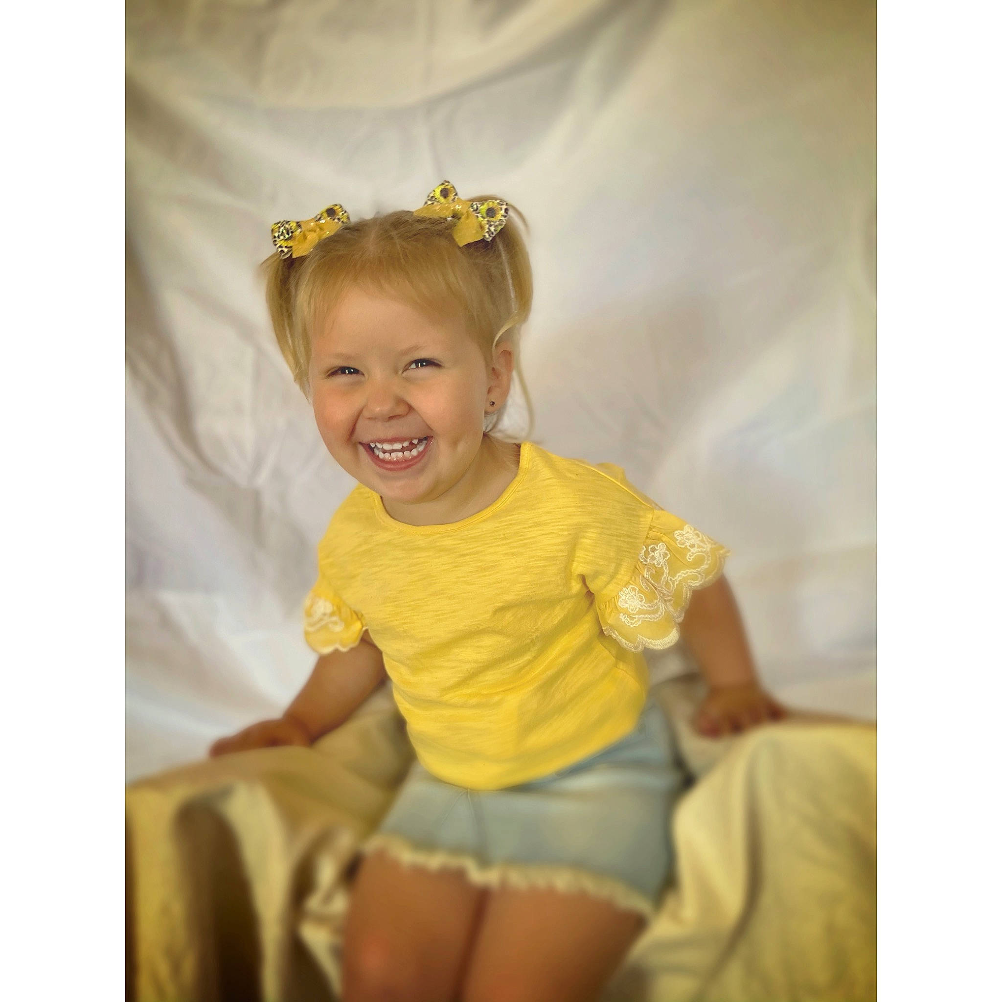 Indiana is registered to the contest to win money with this photo: baby, baby_toddler_clothing, blond, child, child_model, clothing, costume, ear, fashion_accessory, hair_accessory, headgear, headpiece, joy, person, product, shorts, sleeve, smile, sportswear, t_shirt
