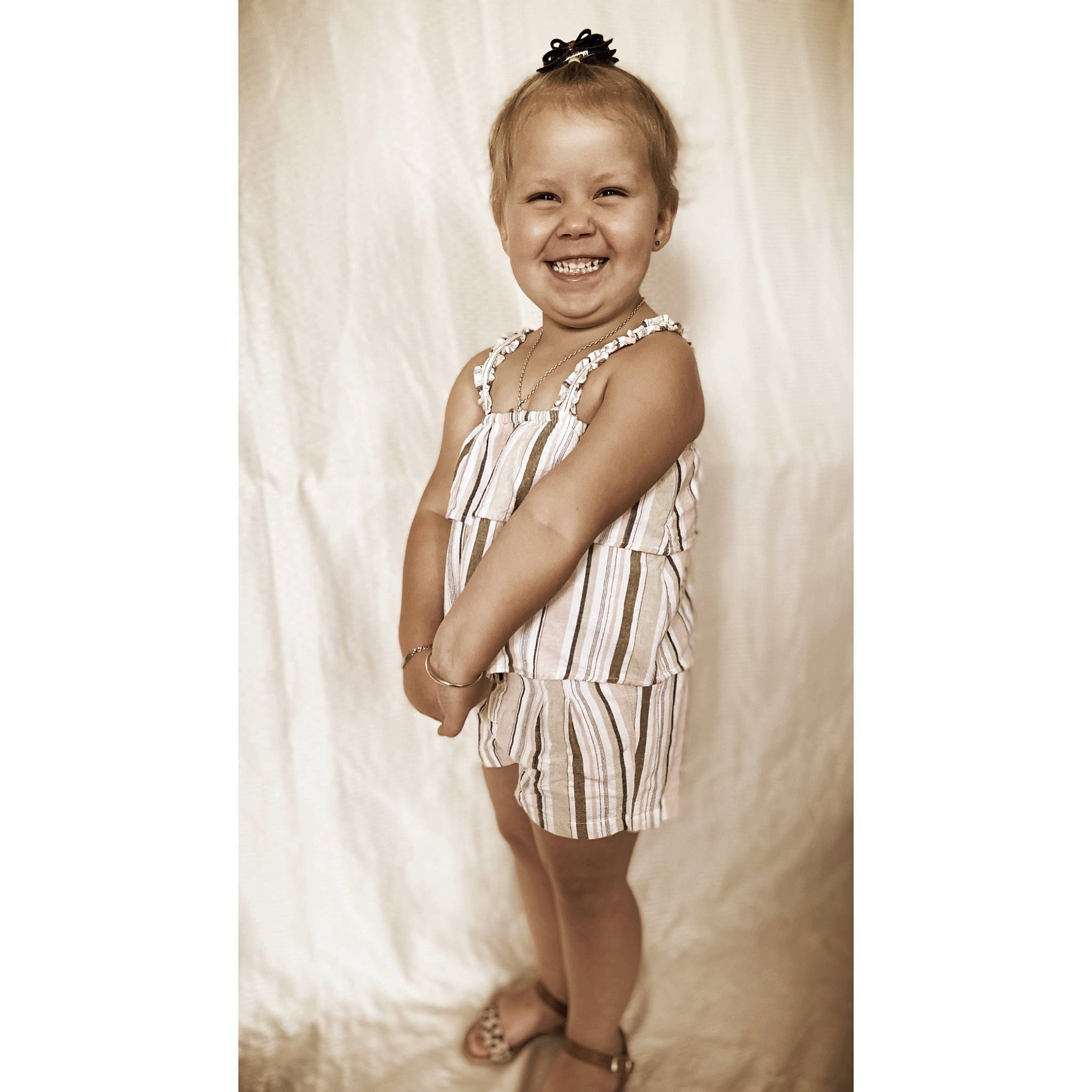 Indiana joined the competition — help win amazing prizes! child, child_model, clothing, cocktail_dress, dress, fashion_accessory, fashion_design, hairstyle, joy, model, person, photo_shoot, photography, shoulder, smile, style, toddler, white