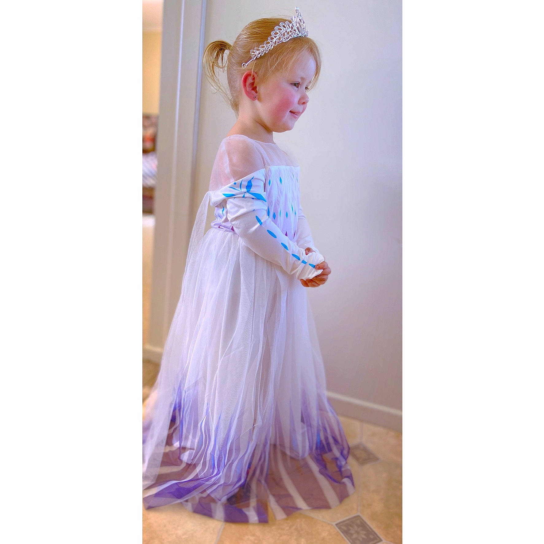 Indiana is registered to the contest to win money with this photo: a_line, child, clothing, costume, dress, fashion_accessory, formal_wear, gown, hair_accessory, haute_couture, headband, headgear, headpiece, lavender, lilac, person, pink, purple, shoulder, toddler