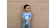 Joseph joined the competition — help win amazing prizes! architecture, boy, brick, building, child, clothing, face, footwear, head, jeans, male, pants, person, photography, portrait, shoe, sitting, sleeve, standing, t_shirt