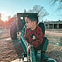 Joseph joined the competition — help win amazing prizes! boy, child, clothing, face, happy, head, jeans, machine, male, nature, outdoors, pants, person, photography, playarea, portrait, sitting, sky, smile, wheel
