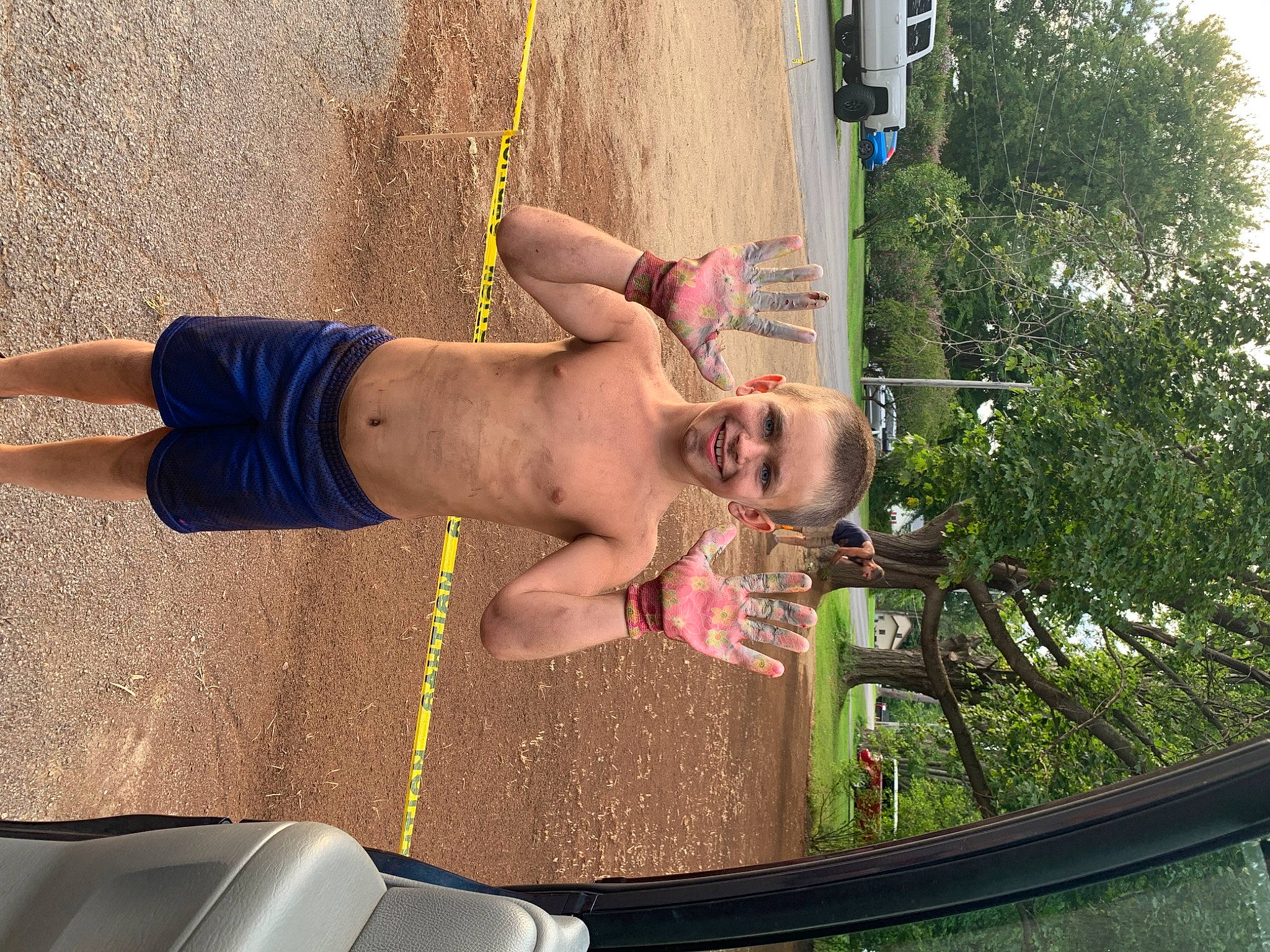 Connor is registered to the contest to win money with this photo: auto_part, automotive_exterior, automotive_tire, automotive_window_part, car, chest, elbow, fun, human_leg, joy, knee, leisure, person, plant, recreation, thigh, tire, tree, trunk, vehicle_door