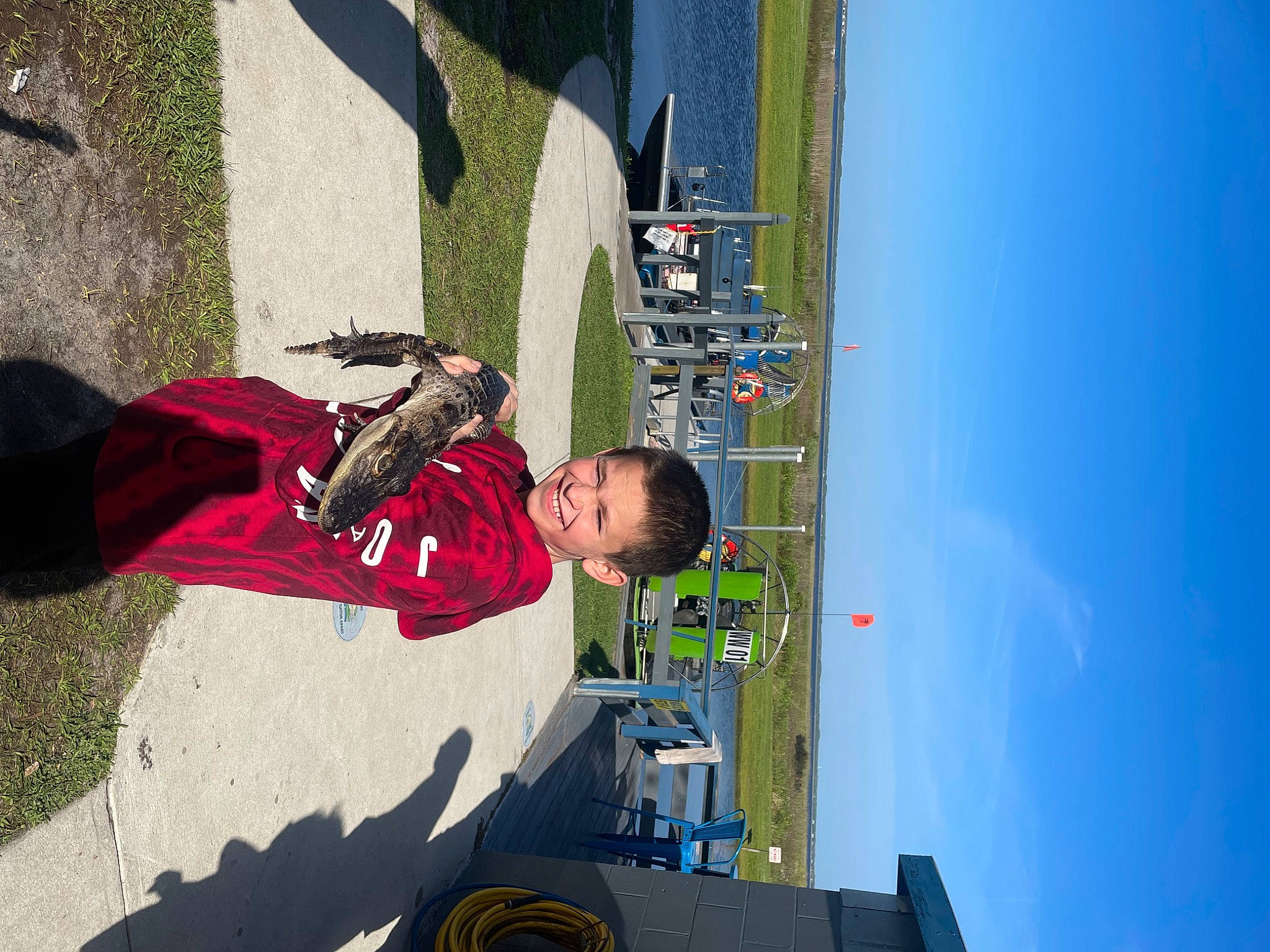 Connor joined the competition — help win amazing prizes! adventure, carmine, concrete, electric_blue, extreme_sport, facade, fun, joy, leisure, person, recreation, shadow, sky, sport_climbing, travel, tree, walking_shoe, world