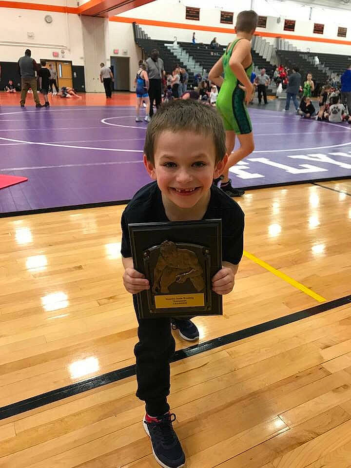 Connor joined the competition — help win amazing prizes! ball_game, chair, clothing, competition_event, floor, flooring, fun, hardwood, indoor_games_and_sports, joint, joy, leisure, person, smile, sneakers, sports, sportswear, team_sport, toddler, tournament