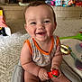 Henry joined the competition — help win amazing prizes! baby, smiling, toy, indoor, carpet, blanket, child, cute, happy, face, person, sitting, home, fireplace, colorful, plaything, infant, arm, leg, clothing
