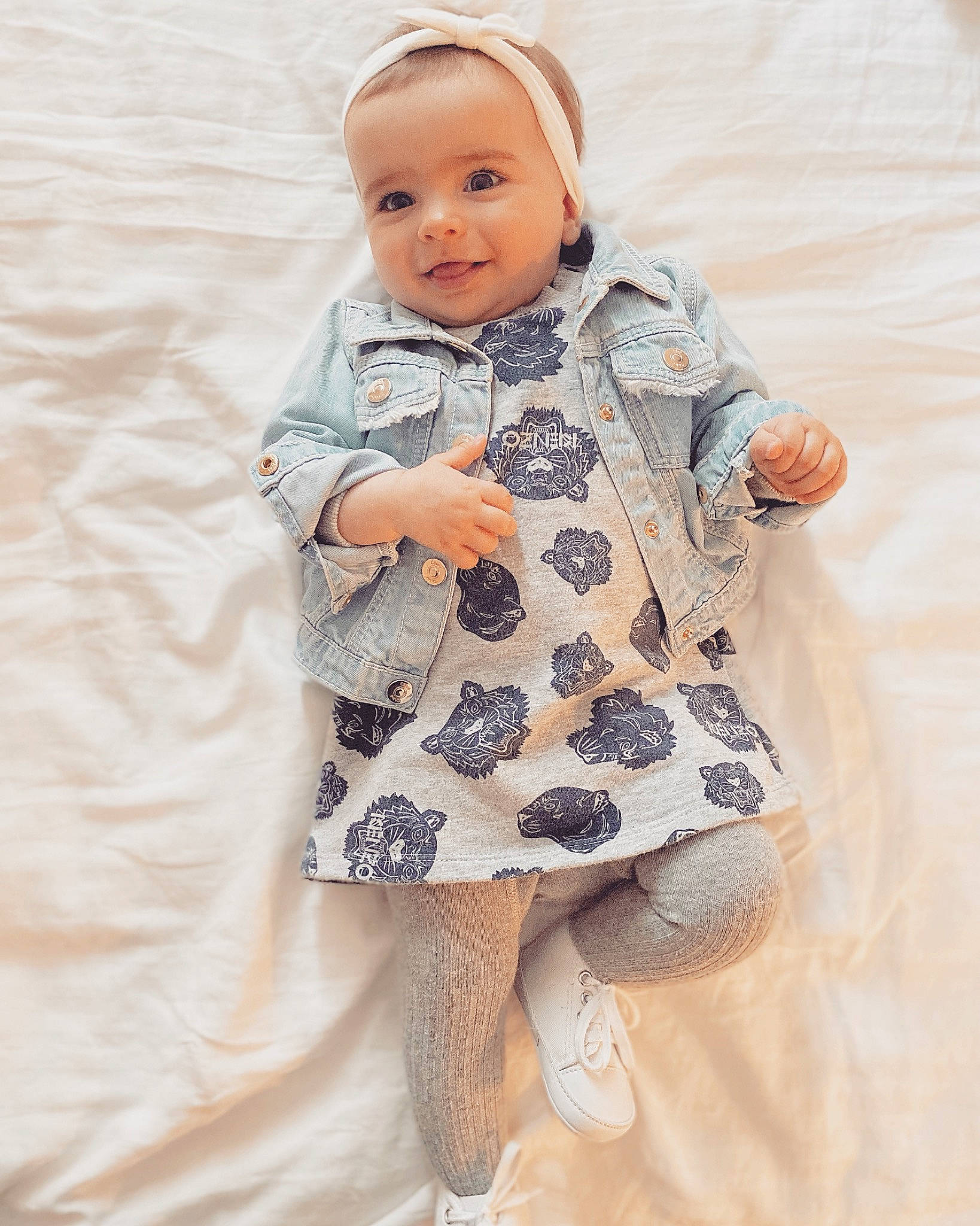 Amaya participe au concours pour gagner de l'argent avec cette photo : baby, baby_toddler_clothing, collar, day_dress, dress, face, hairstyle, happy, head, leg, one_piece_garment, outerwear, pattern, person, photograph, pink, purple, skin, sleeve, textile