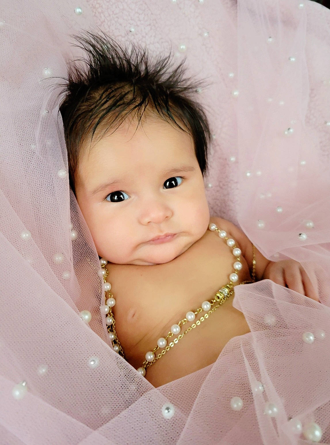 Sofia is registered to the contest to win money with this photo: arm, baby, body_jewelry, cheek, chin, eye, eyebrow, eyelash, flash_photography, hair, hand, happy, head, iris, lip, neck, nose, person, shoulder, skin