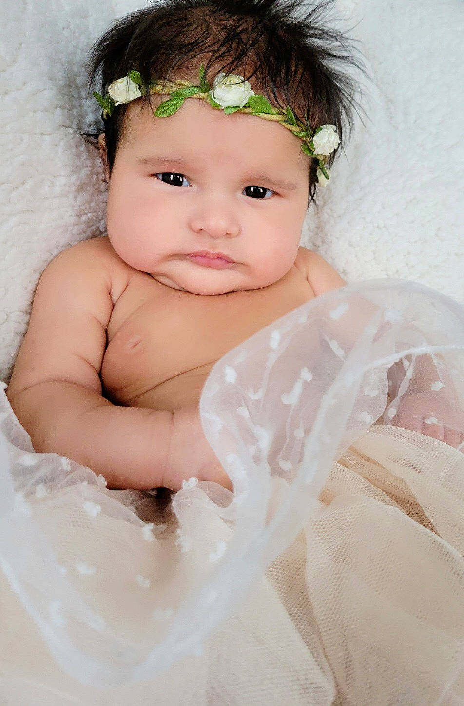 Sofia is registered to the contest to win money with this photo: baby, baby_toddler_clothing, bridal_accessory, cheek, child, embellishment, eye, eyebrow, eyelash, face, flash_photography, happy, head, headband, headgear, headpiece, iris, person, pink, skin