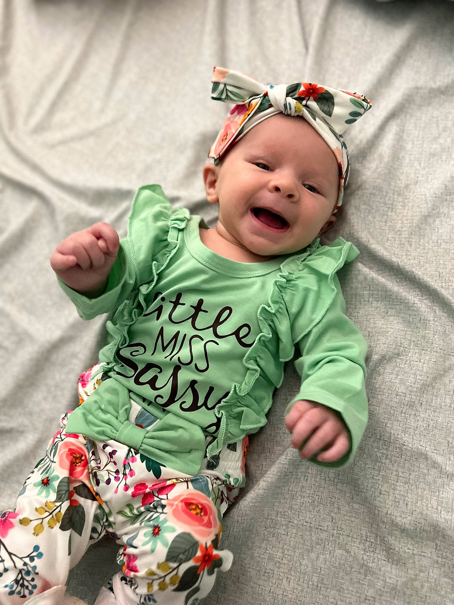 Paisley Rae joined the competition — help win amazing prizes! arm, baby, baby_toddler_clothing, cheek, comfort, cool, eye, face, grass, happy, head, headwear, leg, linens, pattern, person, pink, skin, sleeve, smile