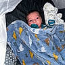 Ario joined the competition — help win amazing prizes! newborn, baby, infant, child, portrait, face, eyes, pacifier, blanket, swaddled, bassinet, crib, sleeping, lying_down, indoor, cozy, dinosaur_pattern, textile, baby_clothing, photography