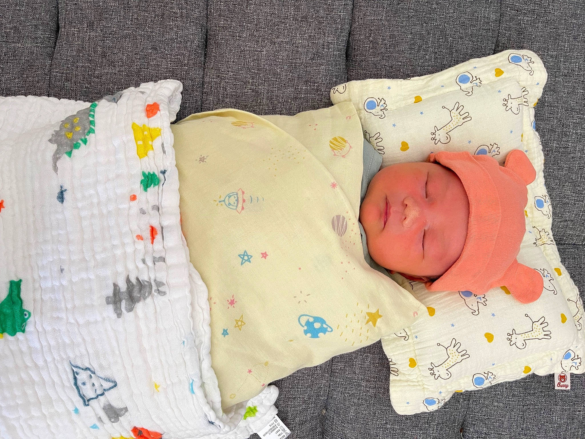 Fynn is registered to the contest to win money with this photo: baby, baby_products, baby_safety, baby_sleeping, baby_toddler_clothing, bedding, bedtime, child, comfort, headwear, linens, nap, pattern, person, room, sleeve, textile, toddler