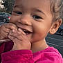 Aniyah is registered to the contest to win money with this photo: child, toddler, smiling, happy, curly_hair, pink_jacket, outdoor, trees, car, parking_lot, face, earring, portrait, cute, hands, person, daylight, nature, emotion, joy