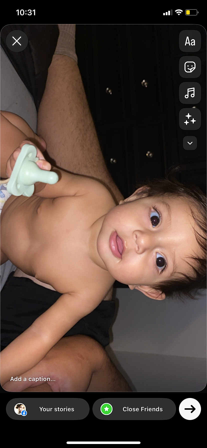 Maceo Noel Gonzales joined the competition — help win amazing prizes! baby, child, pacifier, skin, face, person, indoor, leg, hair, eyes, mouth, hand, torso, cabinet, furniture, human_body, expression, curious, infant, room
