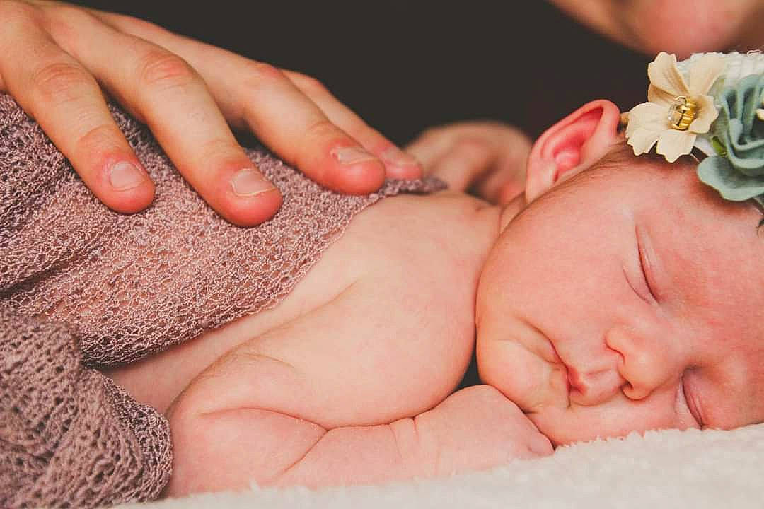 Reya joined the competition — help win amazing prizes! baby, baby_sleeping, baby_toddler_clothing, beauty, cheek, comfort, face, finger, flower, gesture, grass, hand, headwear, human, nail, organ, people, people_in_nature, person, skin