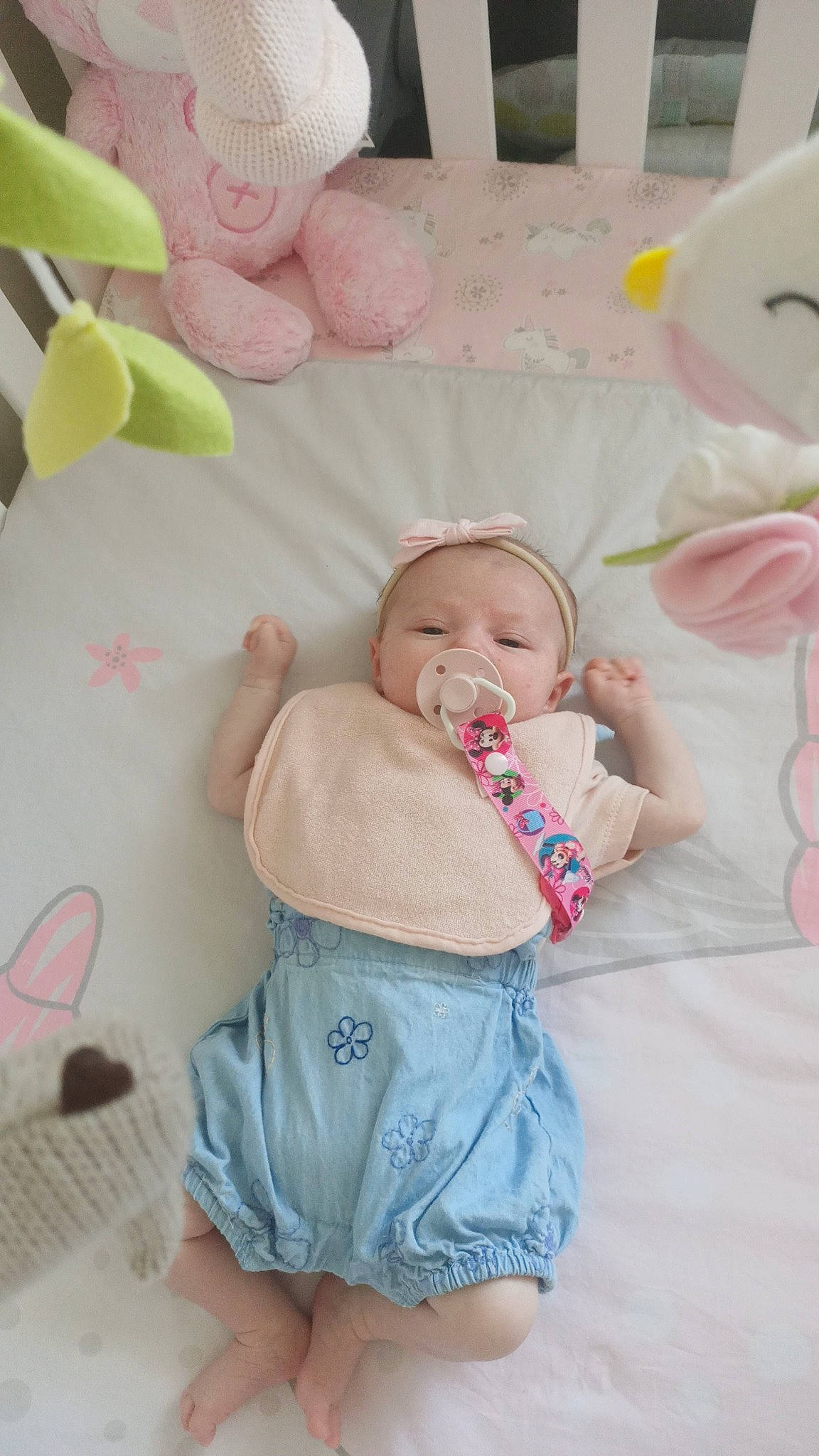 Estelle joined the competition — help win amazing prizes! baby, baby_products, baby_toddler_clothing, bed, bedding, cheek, child, comfort, finger, happy, infant_bed, linens, mouth, person, pink, product, room, skin, smile, textile