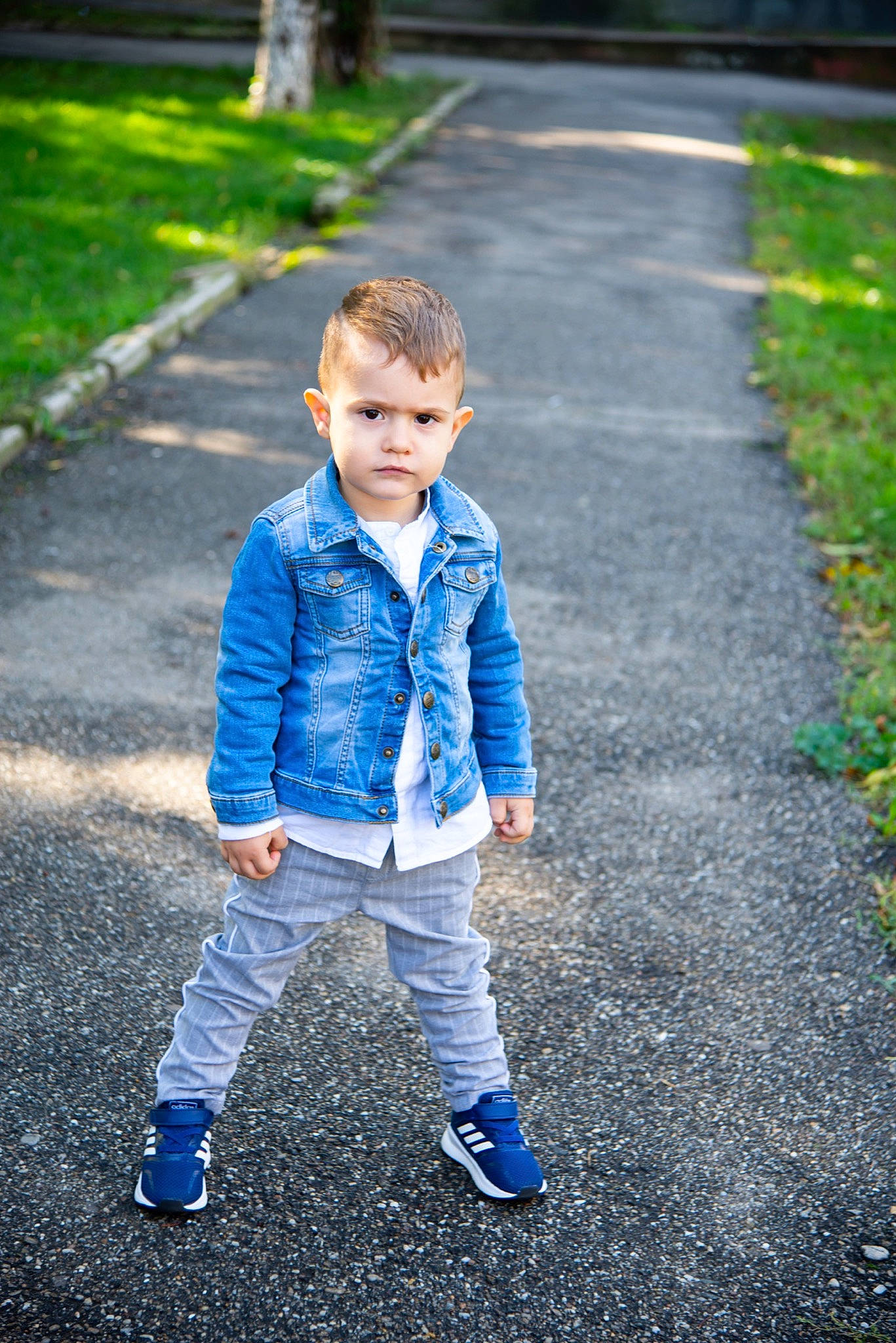 Luca joined the competition — help win amazing prizes! asphalt, denim, electric_blue, flash_photography, fun, gesture, grass, grass_family, hand, happy, human, leisure, mammal, people_in_nature, person, plant, road_surface, standing, toddler, tree