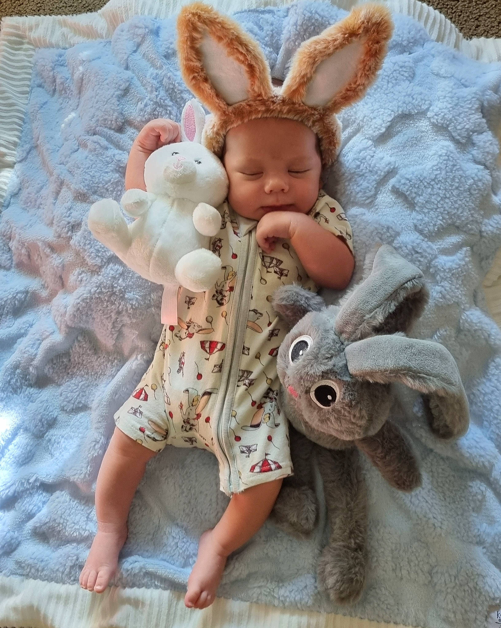 Jude is registered to the contest to win money with this photo: angel, baby_toddler_clothing, doll, event, fashion_accessory, fawn, fur, hand, headwear, linens, pattern, person, plush, rabbit, rabbits_and_hares, sleeve, stuffed_toy, tail, textile, toy