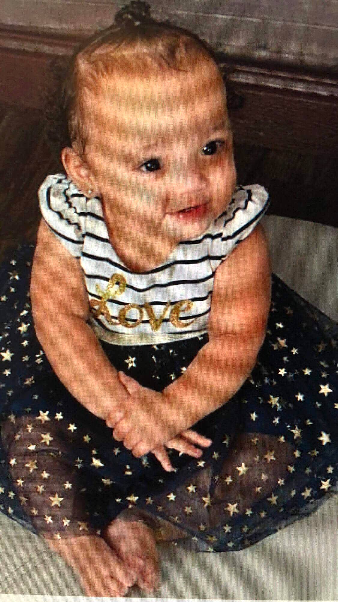 Malayah joined the competition — help win amazing prizes! baby, baby_toddler_clothing, cheek, child, design, dress, eye, face, head, lip, nose, pattern, person, polka_dot, sitting, skin, smile, toddler