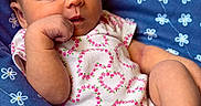 Phebe joined the competition — help win amazing prizes! baby, blanket, blue_blanket, child, closeup, cozy, cute, flower_pattern, foot, hand, heart_pattern, infant, newborn, onesie, peaceful, portrait, resting, skin, sleeping, soft