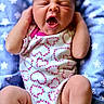 Phebe is registered to the contest to win money with this photo: baby, newborn, infant, yawning, onesie, pink, white, heart_pattern, blue_blanket, floral, closeup, cute, sleepy, hands, legs, skin, expression, portrait, soft, lying_down