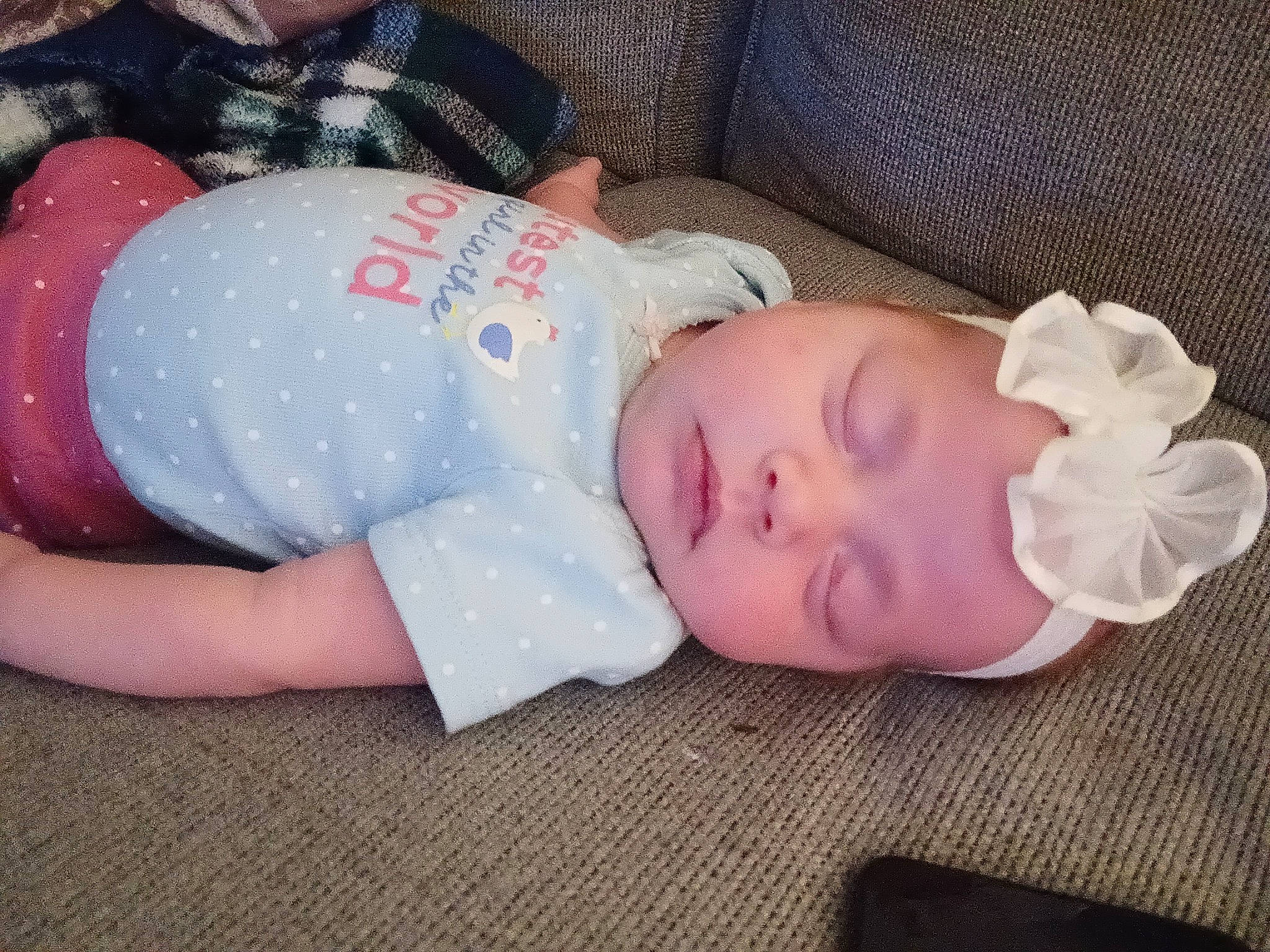 Peyton is registered to the contest to win money with this photo: baby, baby_products, baby_sleeping, baby_toddler_clothing, bedtime, cheek, child, comfort, grass, linens, nap, pattern, person, pink, room, skin, sleep, sleeve, textile, toddler