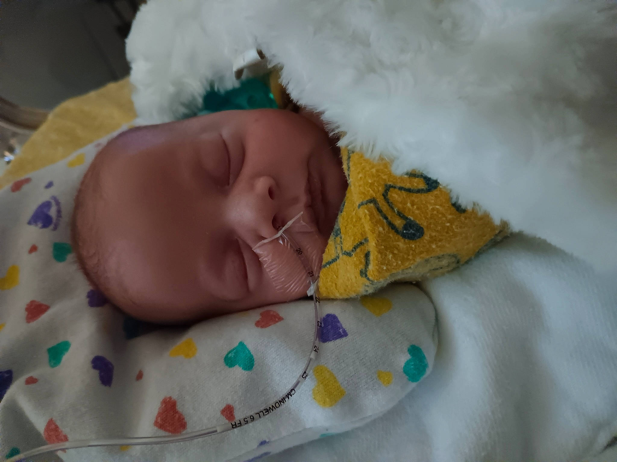 Abel is registered to the contest to win money with this photo: baby, baby_products, baby_sleeping, baby_toddler_clothing, bed_sheet, bedding, bedtime, blanket, child, comfort, fur, hat, linens, nap, pattern, person, room, skin, sleep, toddler