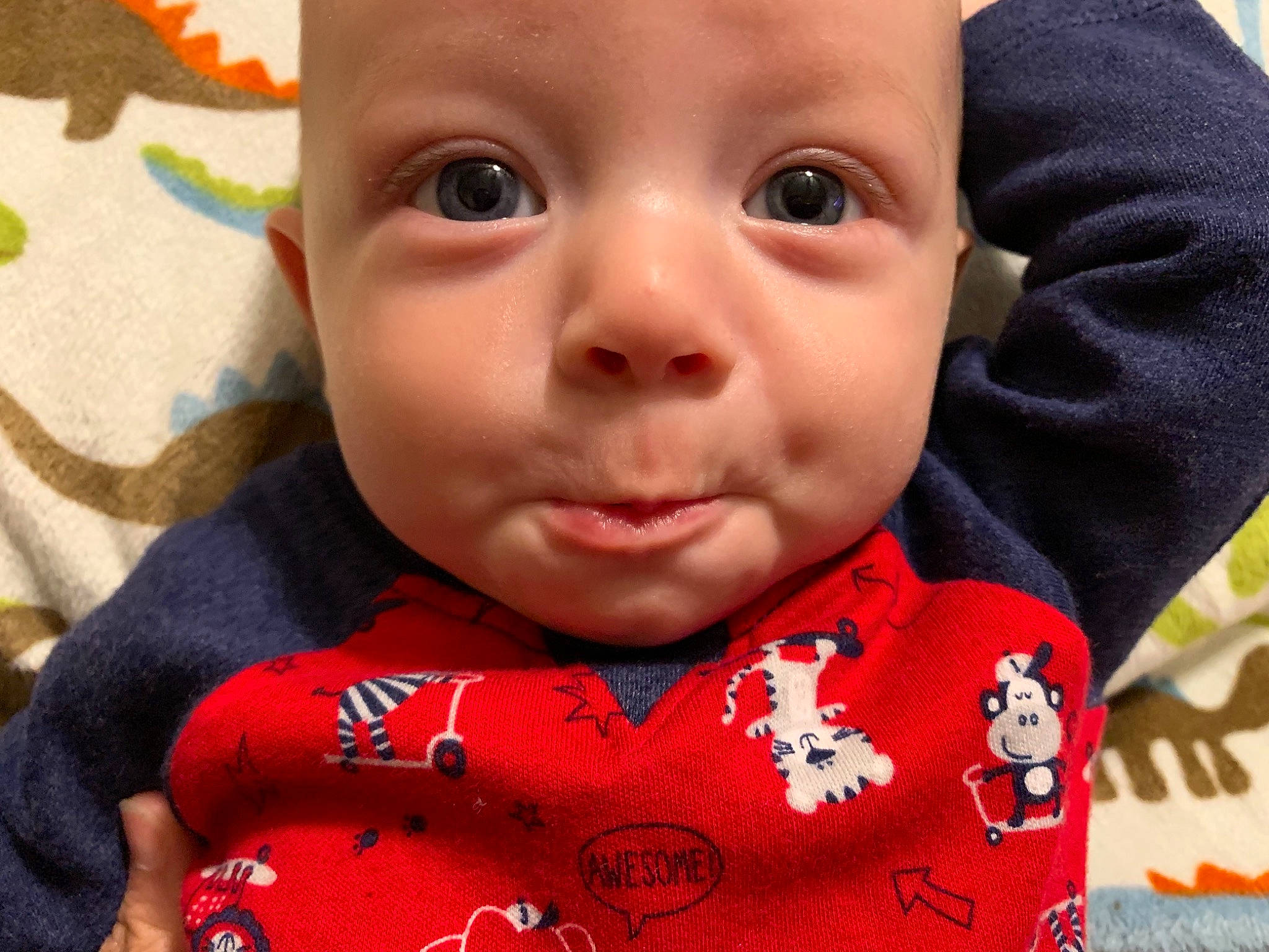 Evander joined the competition — help win amazing prizes! baby, cheek, child, chin, close_up, face, head, lip, mouth, neck, nose, outerwear, person, skin, smile, toddler