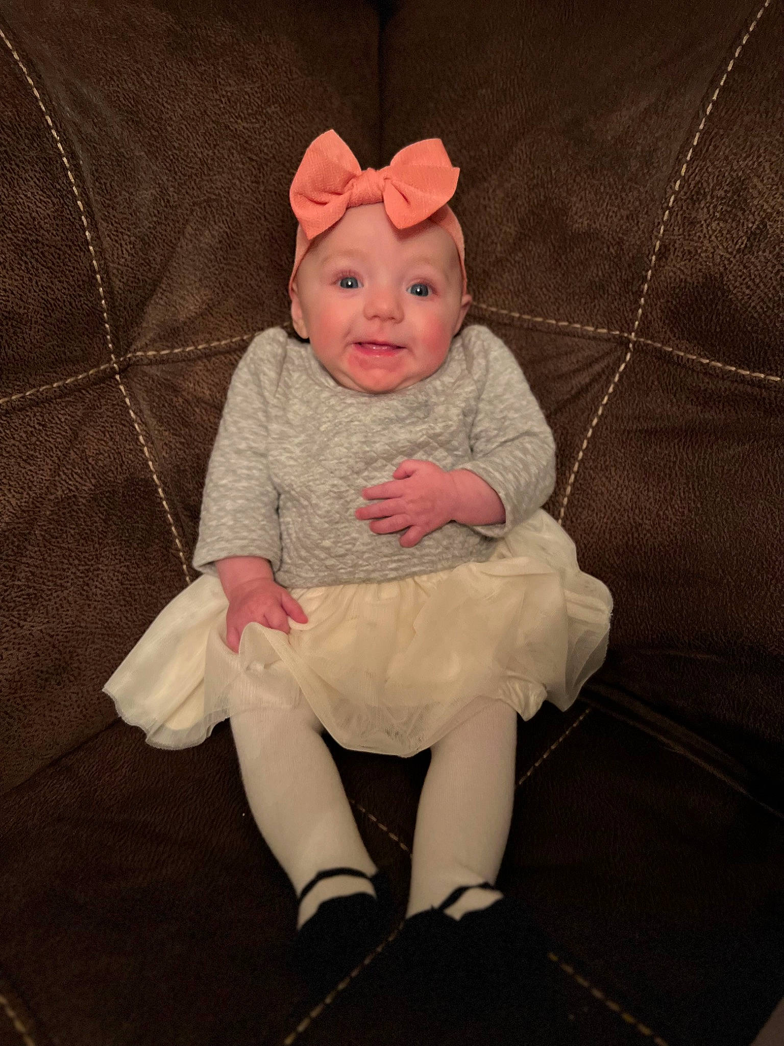 Mylah joined the competition — help win amazing prizes! baby, baby_toddler_clothing, comfort, costume_hat, couch, dress, eye, face, fashion_accessory, flash_photography, happy, head, headwear, human_body, human_leg, iris, knee, person, sitting, sleeve