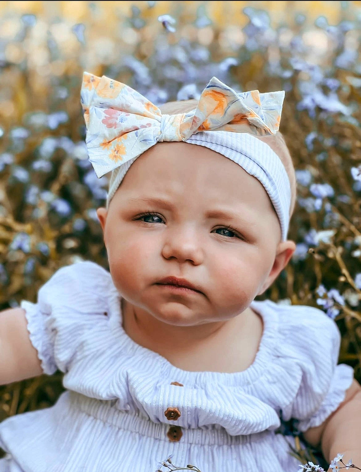 Mylah joined the competition — help win amazing prizes! baby, baby_toddler_clothing, cap, child, costume_hat, eye, eyelash, fun, grass, hair_accessory, happy, headband, headgear, headpiece, headwear, iris, jewellery, lip, people_in_nature, person