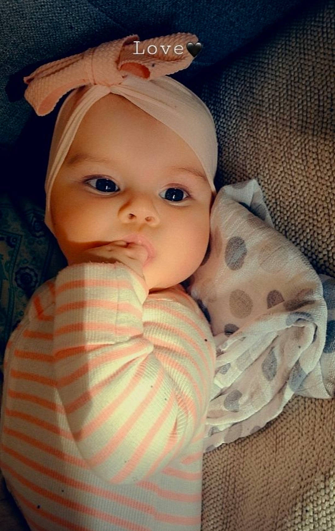 Ally is registered to the contest to win money with this photo: baby, baby_products, baby_sleeping, baby_toddler_clothing, cap, cheek, child, comfort, eyelash, fashion_accessory, finger, hat, iris, linens, lip, mouth, nose, person, skin, textile