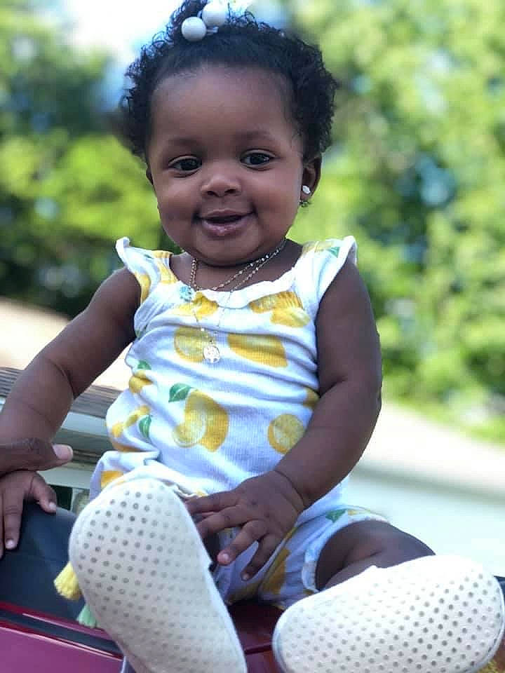 Essence joined the competition — help win amazing prizes! baby, baby_toddler_clothing, child, eye, face, flash_photography, fun, grass, happy, joy, leisure, people_in_nature, person, recreation, sitting, skin, smile, standing, summer, t_shirt