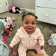 Zaeylnn joined the competition — help win amazing prizes! baby, child, pink_outfit, carpet, hairbrush, clothes, smile, indoor, baby_accessory, pacifier, furniture, drawer, room, electric_outlet, happy, cute, sitting, child_playing, person, portrait