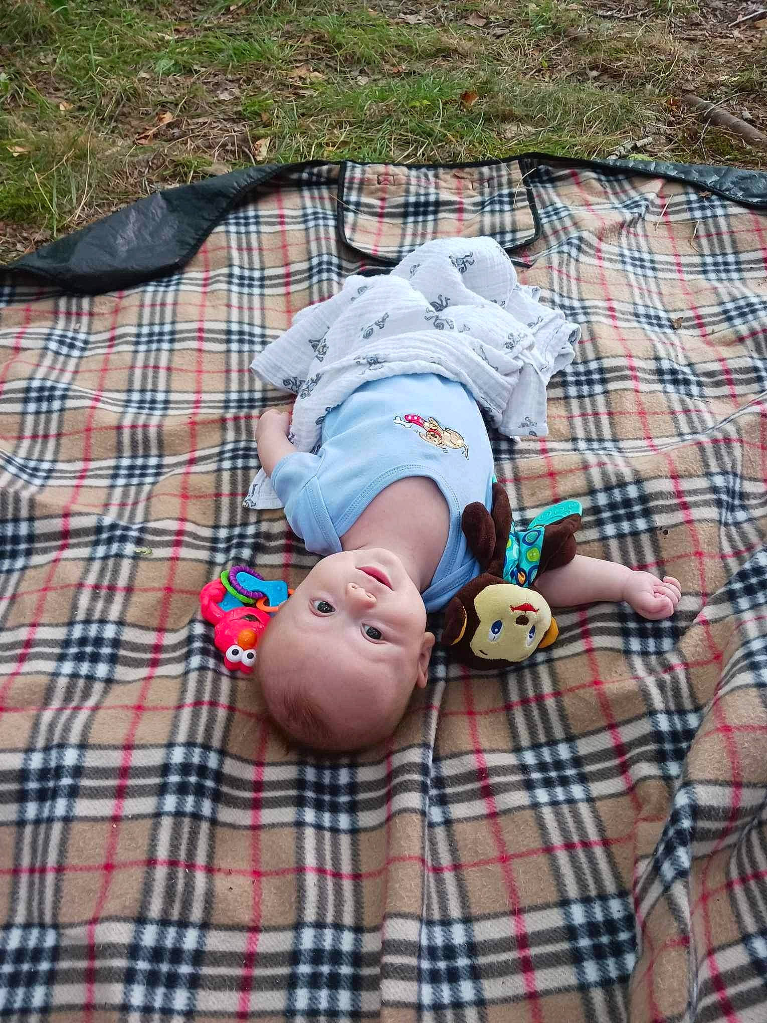 Jayden joined the competition — help win amazing prizes! baby, baby_toddler_clothing, child, comfort, grass, hat, leisure, linens, pattern, person, plaid, recreation, shorts, sitting, sleeve, sock, tartan, textile, toddler