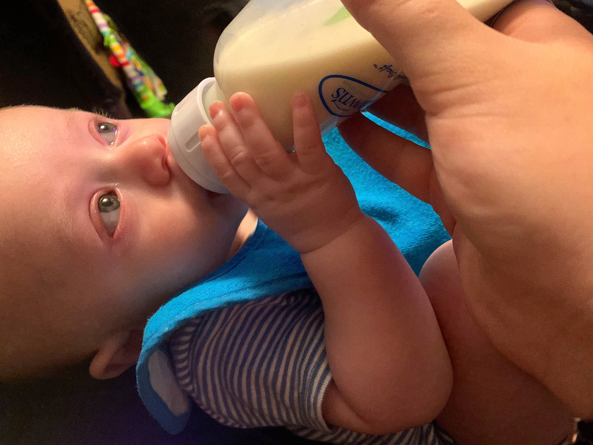 Jayden joined the competition — help win amazing prizes! baby, baby_bottle, baby_toddler_clothing, bottle, cheek, chest, child, drinking, drinkware, eyelash, finger, gesture, hand, nail, neck, person, plastic_bottle, skin, thumb, toddler