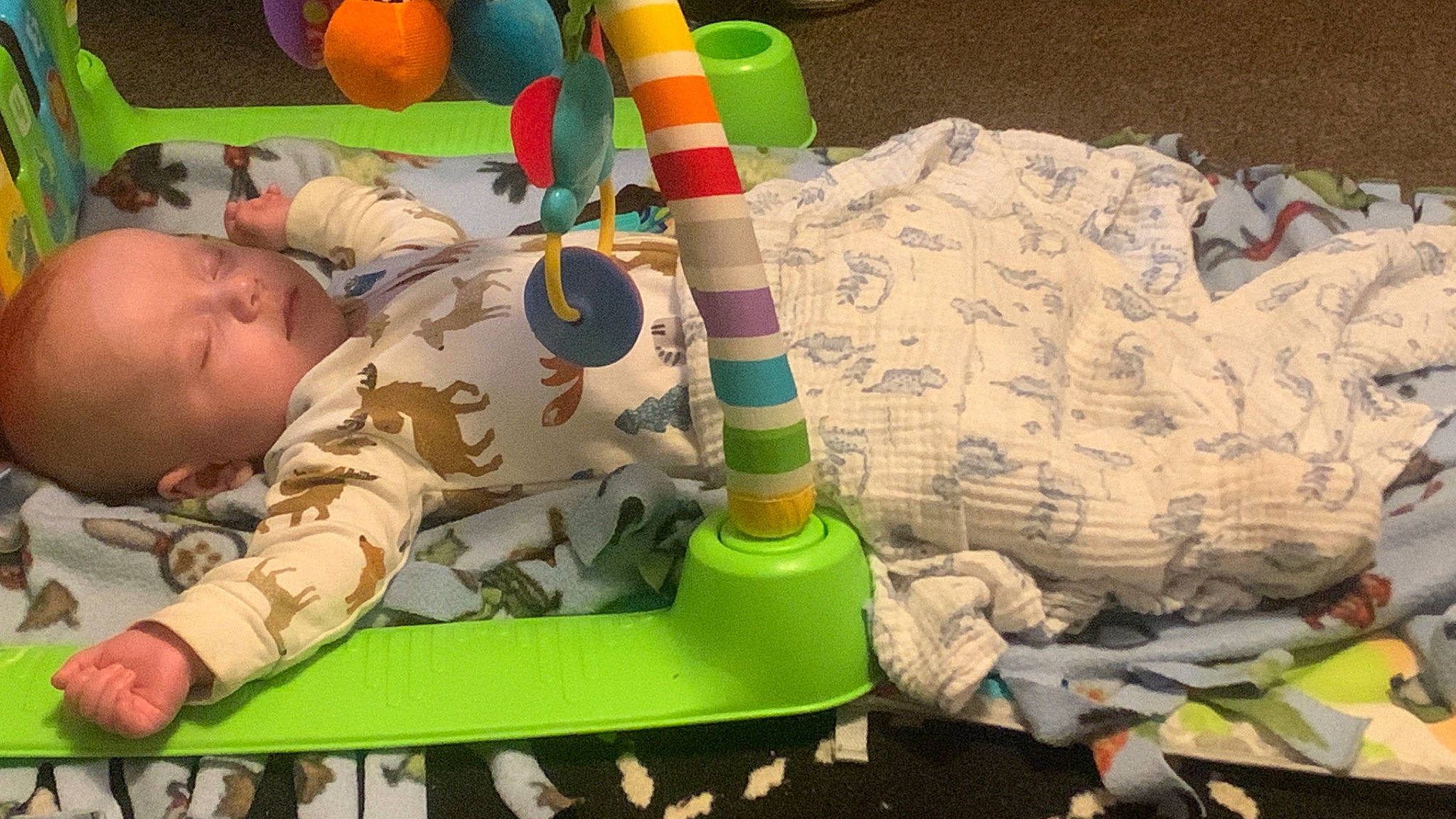 Jayden joined the competition — help win amazing prizes! baby, baby_products, baby_toys, camouflage, child, comfort, flooring, fun, military_camouflage, pattern, person, play, room, sitting, stuffed_toy, toddler, toy